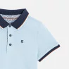 Boy's sky blue cotton piqué polo shirt with short sleeves