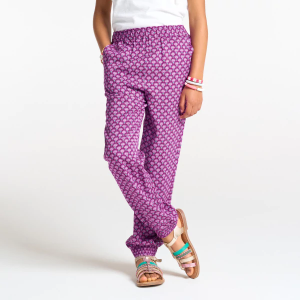 Girls purple printed wide leg trousers.